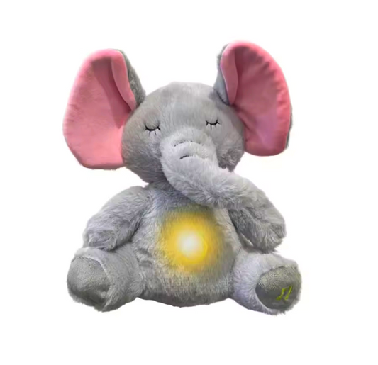 Peluche Elefante que respira, material extra suave, sonidos y luz relajante.